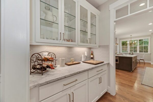 butler pantry with glass front cabinets